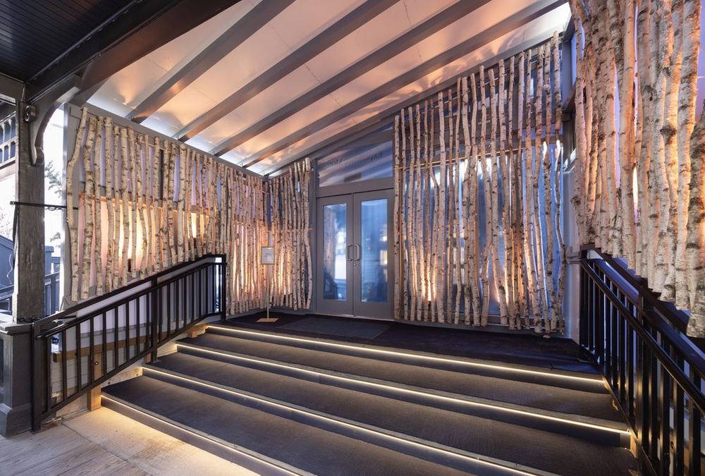 Birch-lined entrance staircase to the Chase Sapphire Reserve property at Sundance 2026